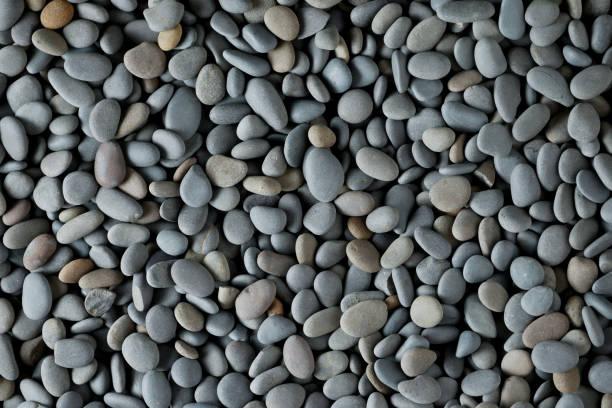 istock Abstract background texture sea stones, top view 1127342166