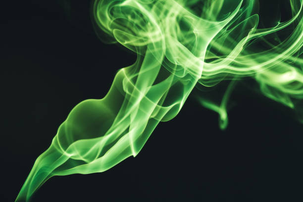 green smoke on black - toxic substance smoke abstract green imagens e fotografias de stock