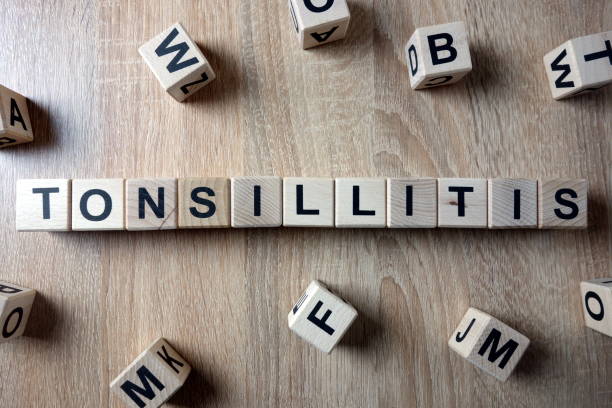 istock Tonsillitis word from wooden blocks 1127344434