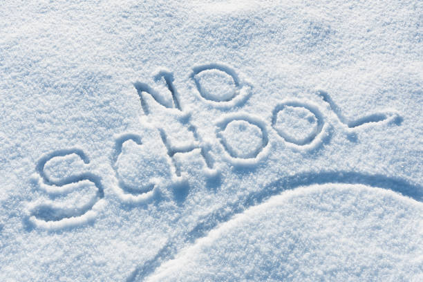 istock NO SCHOOL! Written in the freshly fallen snow 1127345969