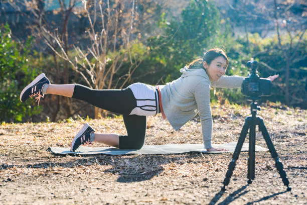 istock Sportswoman vlogging her sports routine 1127346190