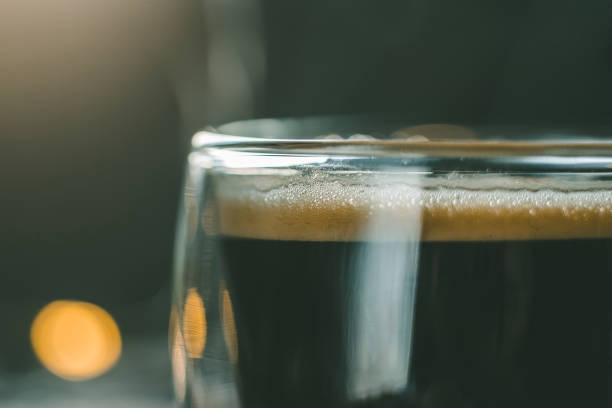 istock close-up coffee creamer with beautiful light. espresso in a glass cup 1127346470