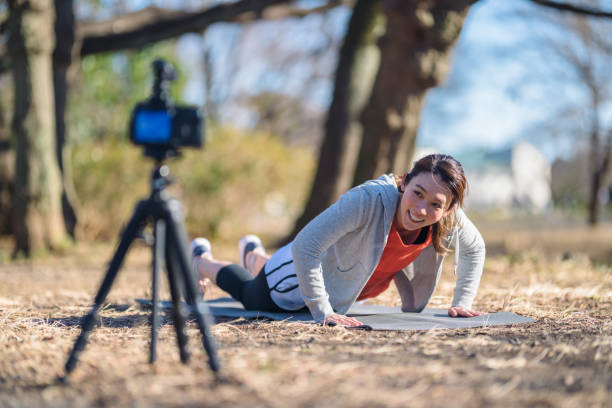 istock Sportswoman vlogging her sports routine 1127346623