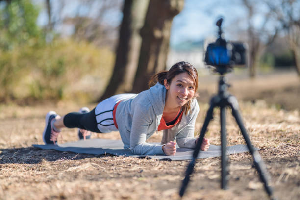 istock Sportswoman vlogging her sports routine 1127346789