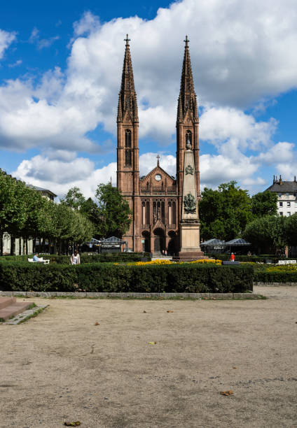 Bonifatius Church, Wiesbaden, Germany People walking near the Lutheran Bonifatius Church in the city of Wiesbaden, Germany. church hessen religion wiesbaden stock pictures, royalty-free photos & images