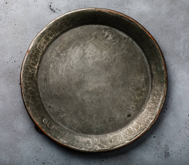istock Vintage metal tray on concrete background copy space 1127347798