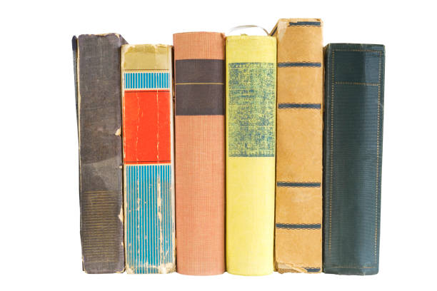 istock Row of old books, isolated on white background. Reading, learning, literature concept. 1127347849