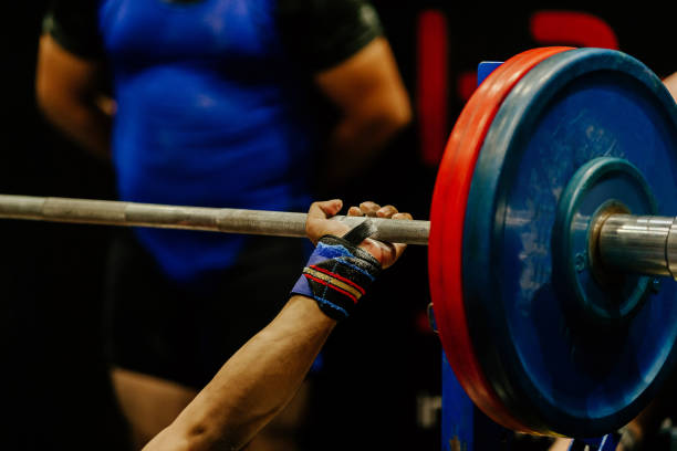 istock hand female powerlifter 1127348038