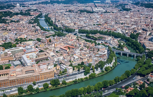 On the sky of one the most beautiful and ancient cities in the world.\nAerial view of The Tiber river, the Tiberina island, the ancient district of Trastevere and the Jewish ghetto.