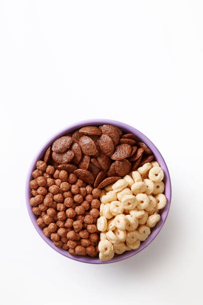 istock Bowl of various cereals isolated on a white background viewed from above. Top view. Copy space 1127348862