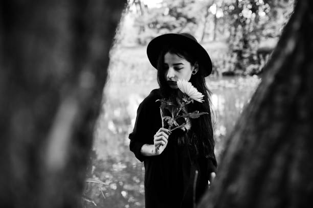 istock Sensual girl all in black 1127351294