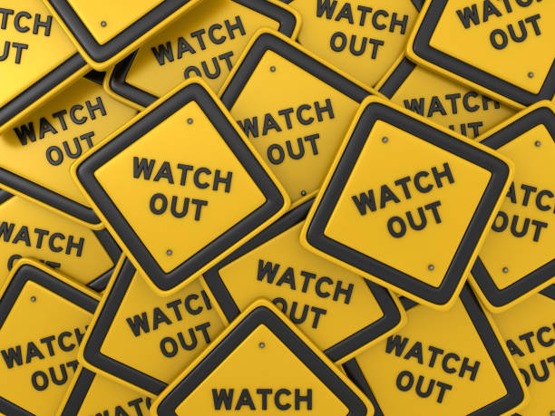 istock WATCH OUT Road Sign - 3D Rendering 1127351814