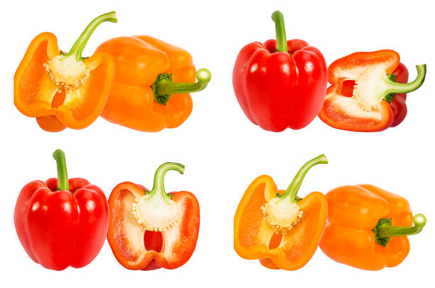 istock Red and yellow sweet peppers bell isolated on white background with clipping path set 1127353775