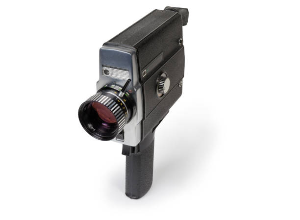 Old amateur electric film movie camera on a white background Old amateur film movie camera Super 8mm format driven by electric motor on a white background vintage amateur movie camera stock pictures, royalty-free photos & images