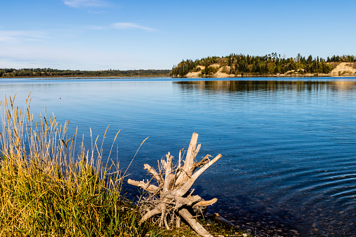 blue waters and rugged shorelines await the visotor to Gelnnifer lakes Provincial Recreation Area