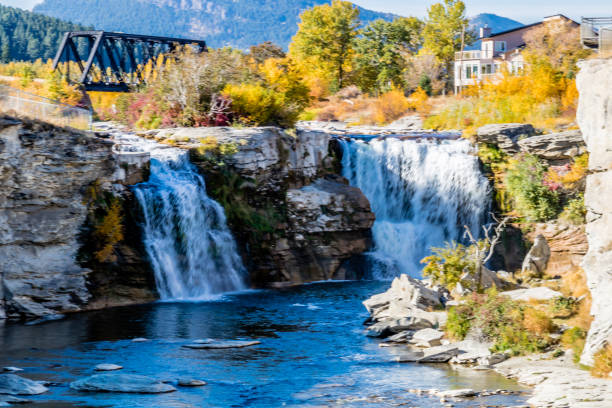 istock Twin falls spill over the Crowsnest River at Lundbreck Falls Provincial Recreation Area, Alberta, Canada 1127355702
