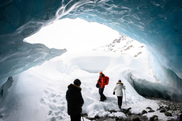 istock Guided tour in a majestic ice cave 1127356578