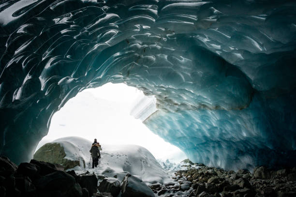 istock Guided tour in a majestic ice cave 1127356672