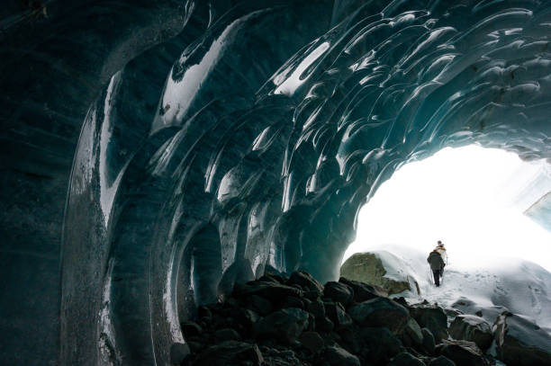 istock Guided tour in a majestic ice cave 1127356707