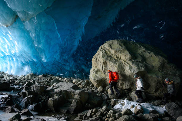 istock Guided tour in a majestic ice cave 1127356711