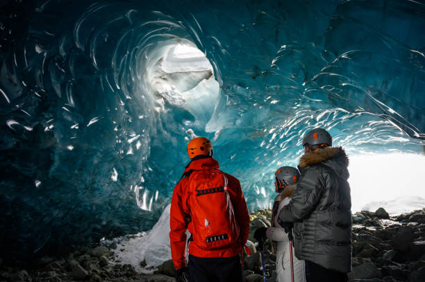 istock Guided tour in a majestic ice cave 1127356844