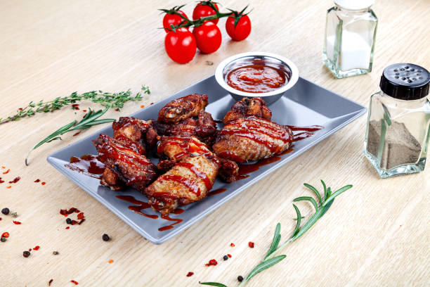 istock Close up view on Chicken strips breaded deep-fried with ketchup on white table.. Beer snack. Restaurant, food menu, recipe, cafe concept. 1127363218