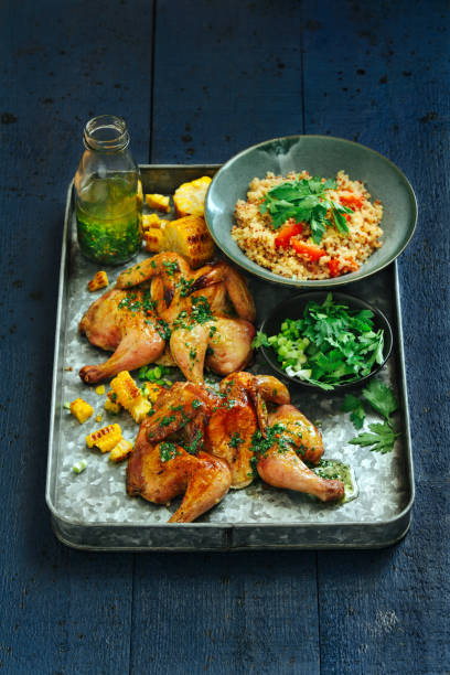 istock Grilled whole butterflied chickens 1127363395