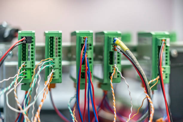 bunch of wires inserted in elctric controller