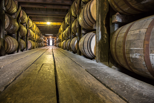 Barrels of Bourbon Whiskey in an aging cellar
