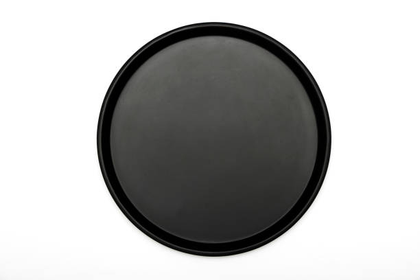 istock Black dish isolated on white background. A mockup of black dishes on a white background. View from above. 1127370085