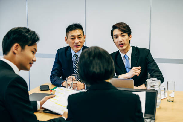 istock Business colleagues discussing in meeting 1127372325