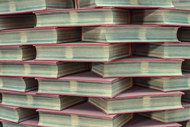 istock Stacked books on books 1127374026