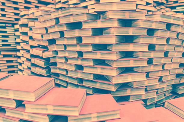 istock Stacked books on books 1127377685