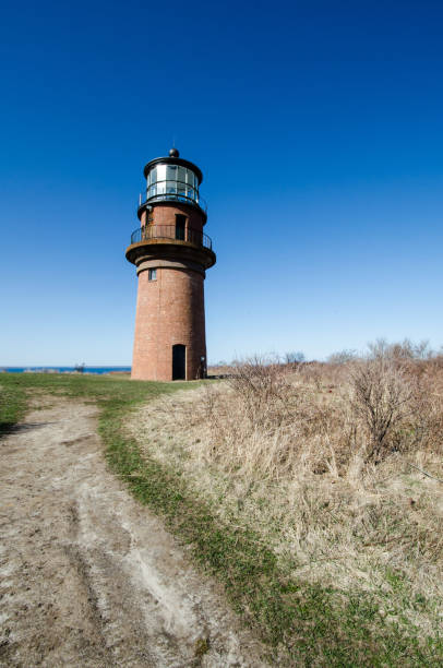 istock Aquinnah Head view with Gay Head Lighthouse on Cape Cod on a sunny day 1127377920