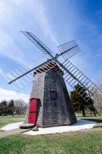 istock Eastham Windmill was built in 1680 and today, this historic old fashioned mill sits in a Cape Cod Park in Massachusetts. 1127379242