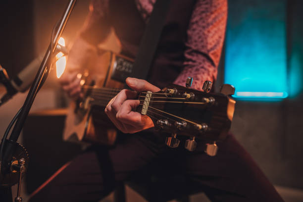 istock Rock musician playing acoustic guitar 1127382222