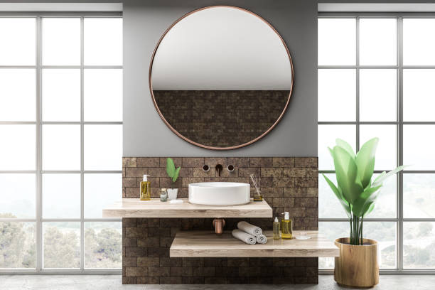 istock Bathroom sink in brick room interior 1127385753