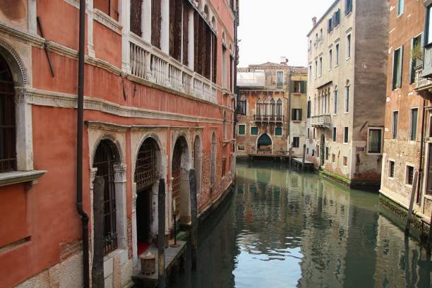 istock A peaceful side canal in Venice, Italy. 1127385892