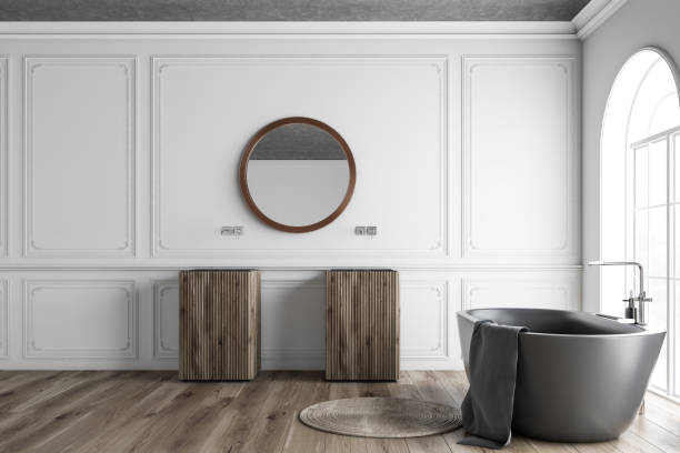 istock White bathroom, gray tub and sinks 1127385989