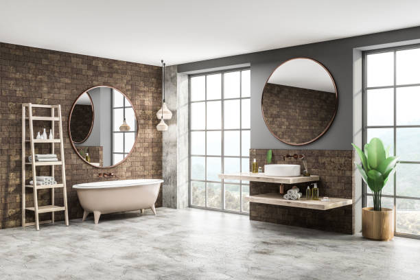 istock Brick bathroom corner, tub and sink 1127386329