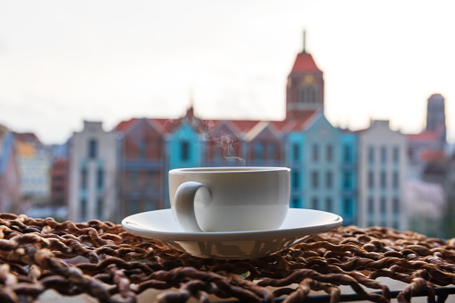 Cup of coffee and Gdansk view, Poland.