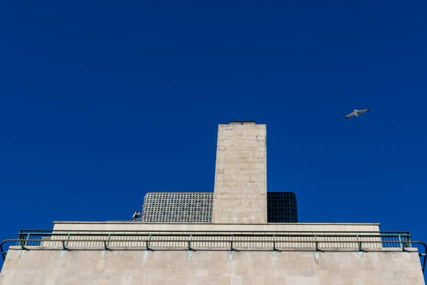 istock Gable wall and chimney clad in limestone of a modern office building 1127387686