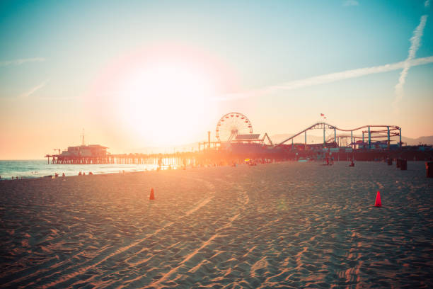 istock Sunset over Santa Monica beach with famous amusement park 1127390718
