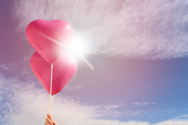 istock Pink heart shaped balloons 1127391671