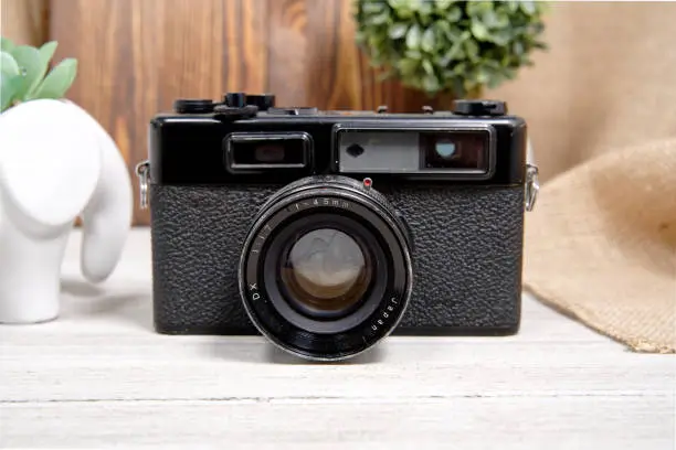 An image of a vintage Yashica rangefinder camera with a fixed 45mm f.17 lens