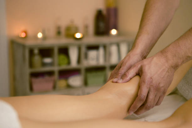 istock Woman getting leg massage 1127393460