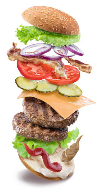 istock Hamburger ingredients falling down one by one to create a perfect meal. 1127394008