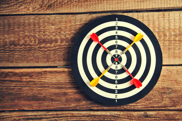 istock Darts Board with wooden background 1127397210