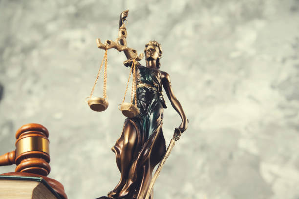 istock book with justice lady and judge 1127397235