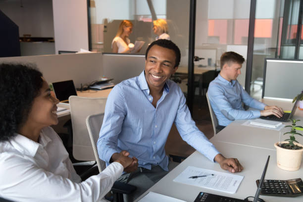 istock Black business people meet and shaking hands greeting each other 1127397466
